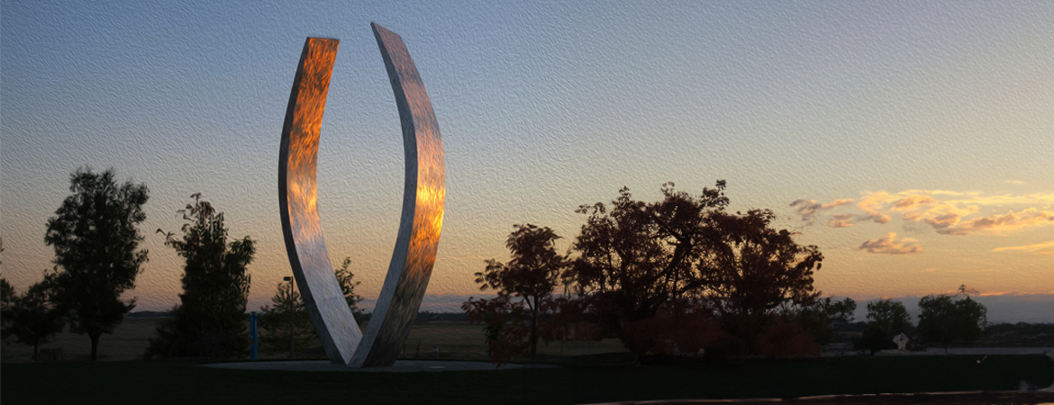 UC Merced Beginnings sculpture at sunset